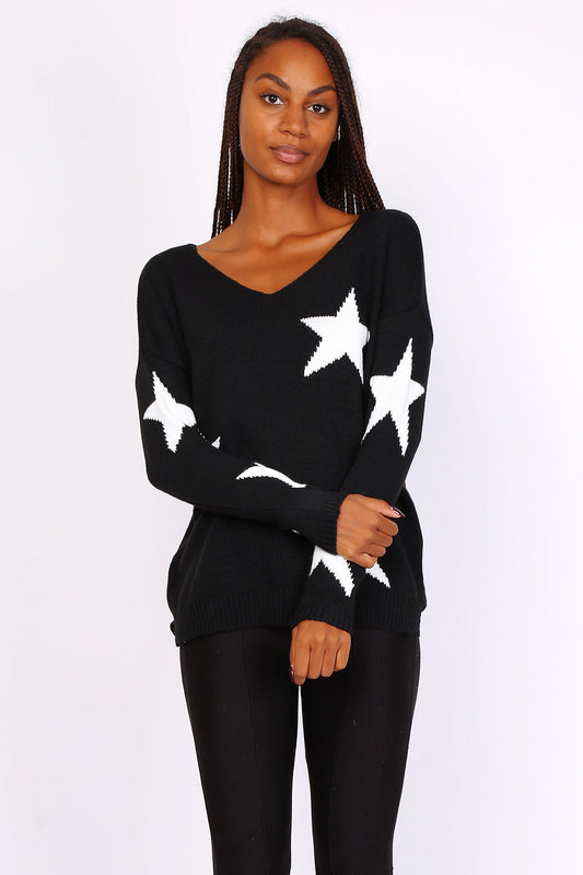 Suéter negro con estrellas blancas